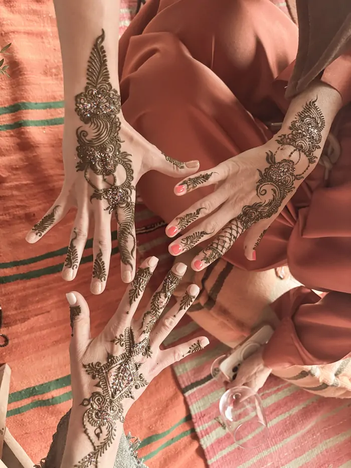 Henna art on open hands