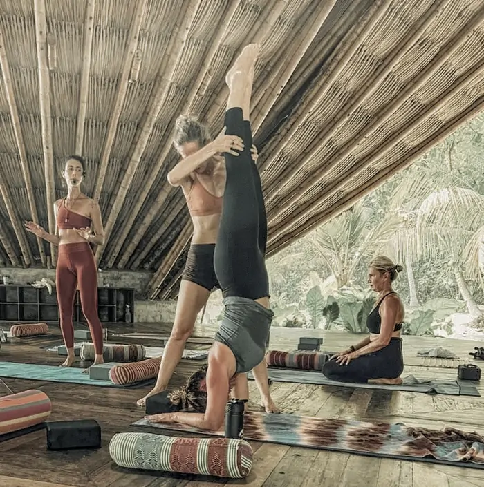 Yoga practice in the open bamboo shala